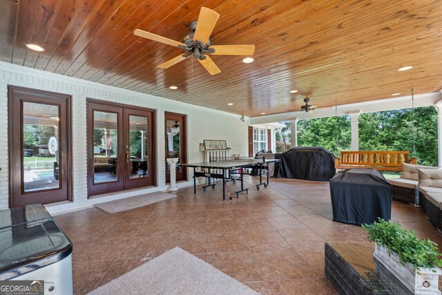 view of patio featuring grilling area, an outdoor living space, french doors, and ceiling fan