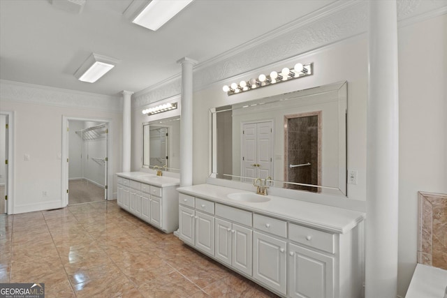 bathroom with vanity and crown molding