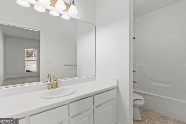 full bathroom featuring tile patterned flooring, vanity, toilet, and tub / shower combination