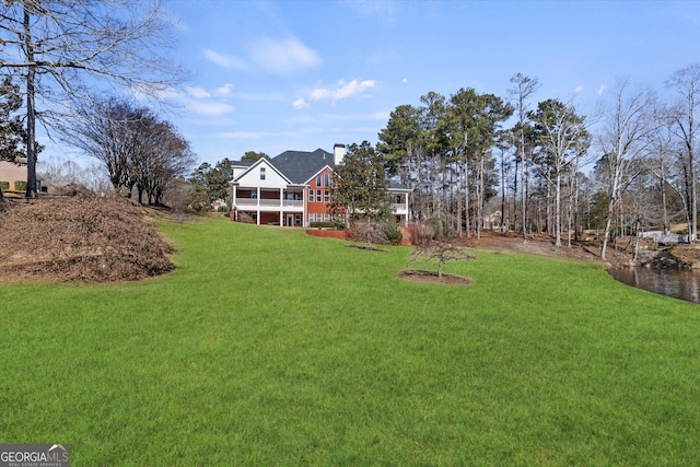 view of yard with a sunroom