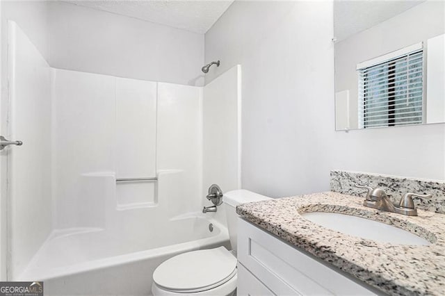 full bathroom with shower / tub combination, vanity, a textured ceiling, and toilet