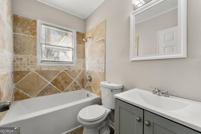 full bathroom with vanity, toilet, and tiled shower / bath combo