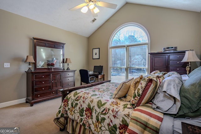 bedroom with multiple windows, ceiling fan, light carpet, and vaulted ceiling