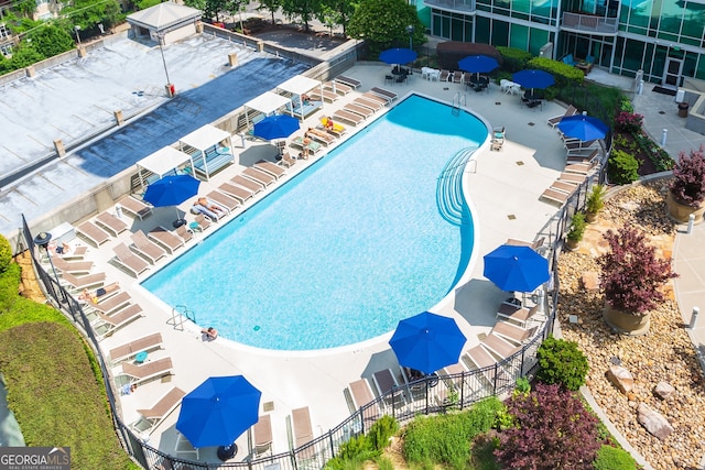 view of swimming pool with a patio