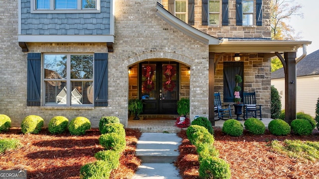 property entrance featuring covered porch