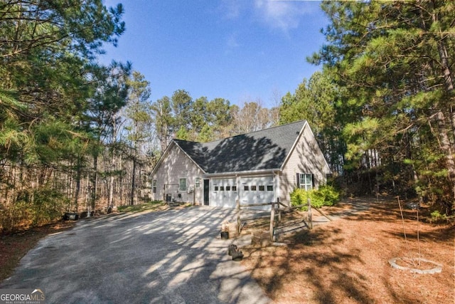 exterior space with a garage