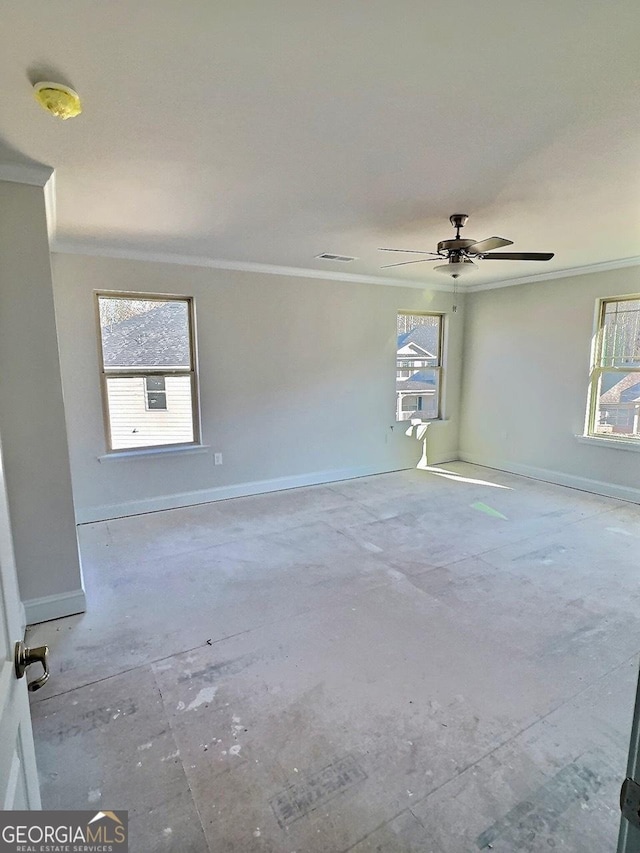 empty room with crown molding and ceiling fan