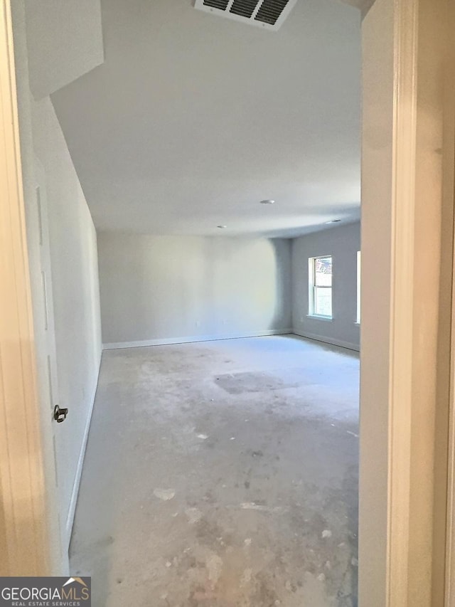 empty room featuring concrete flooring