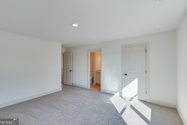 240 Good Hope Preserve, Good Hope, GA 30641 - unfurnished bedroom featuring light colored carpet, recessed lighting, and ensuite bath