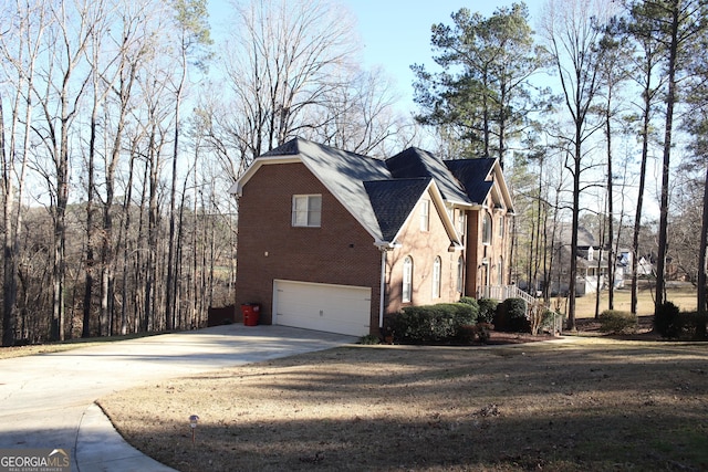 view of side of home with a garage