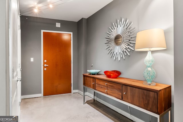 foyer with concrete floors