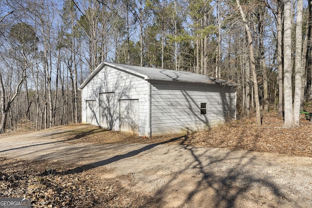 view of outbuilding with a garage