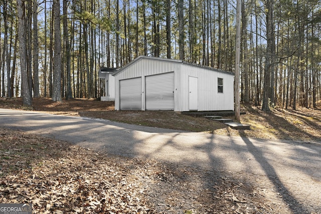 view of outdoor structure with a garage