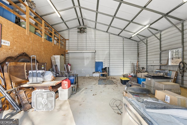 garage featuring a carport