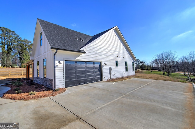 view of home's exterior with a garage