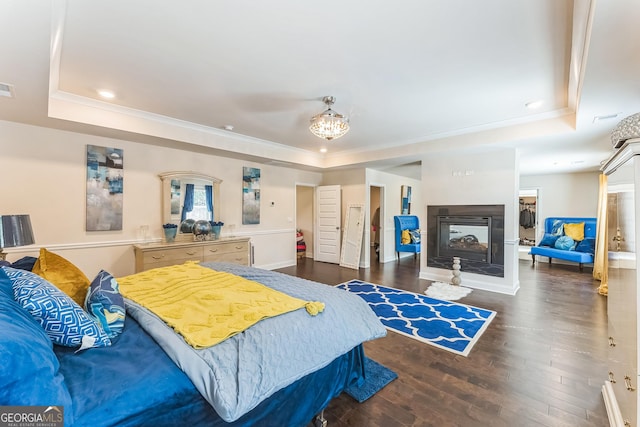4051 Rotterdam Pass, Hampton, GA 30228 - bedroom featuring a raised ceiling, dark wood-style floors, baseboards, ornamental molding, and recessed lighting