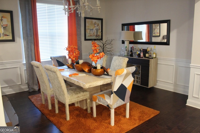 dining area featuring a healthy amount of sunlight and dark hardwood / wood-style floors