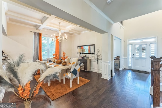4051 Rotterdam Pass, Hampton, GA 30228 - dining space with a chandelier, beamed ceiling, coffered ceiling, dark wood-style flooring, and wainscoting