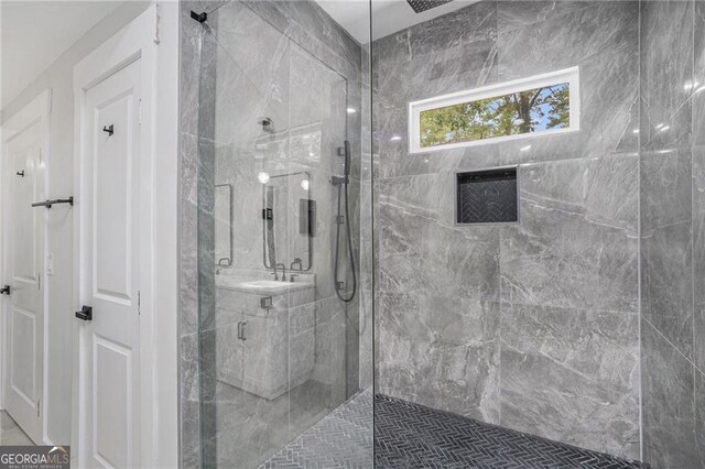 bathroom featuring tile walls and a bathtub