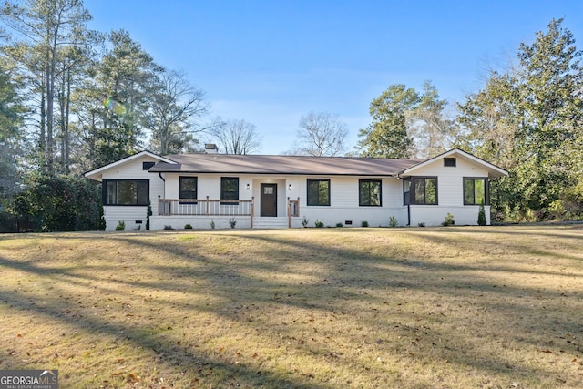 single story home featuring a front yard