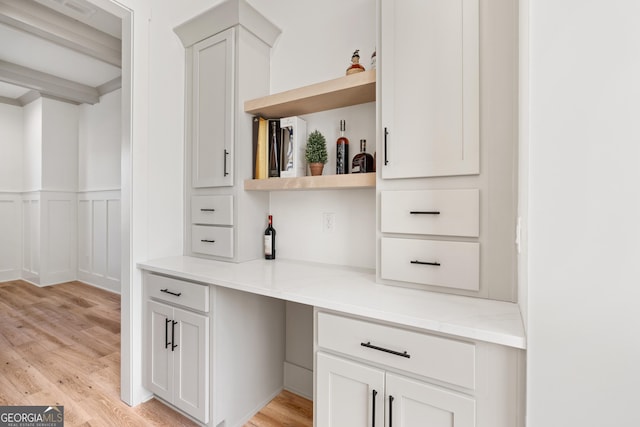 1757 Traditions Way, Jefferson, GA 30549 - bar with white cabinets, light wood-type flooring, and light stone counters
