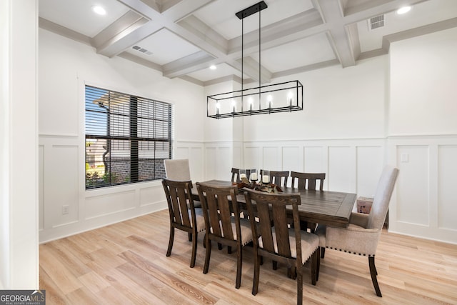 1757 Traditions Way, Jefferson, GA 30549 - dining area featuring a notable chandelier, beam ceiling, light wood-type flooring, and coffered ceiling