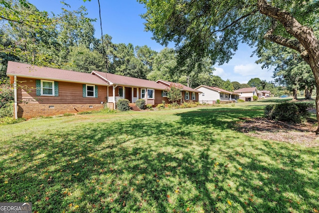 exterior space featuring a front yard