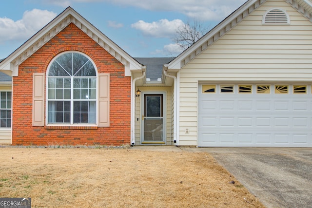 front of property featuring a garage