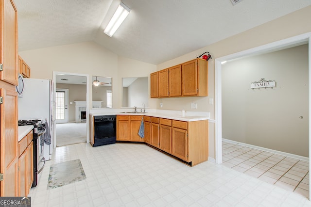 kitchen with lofted ceiling, black dishwasher, ceiling fan, sink, and gas range