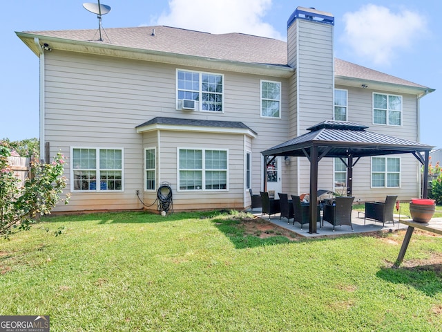 back of property with a yard, cooling unit, a patio, and an outdoor hangout area