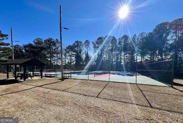 view of community with a gazebo and tennis court