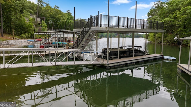 view of dock with a water view