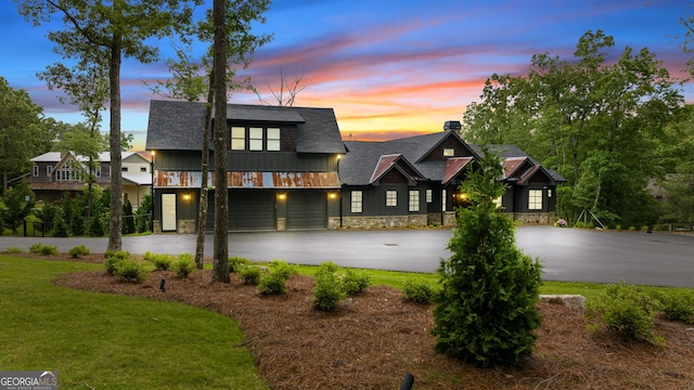 view of front of home with a yard