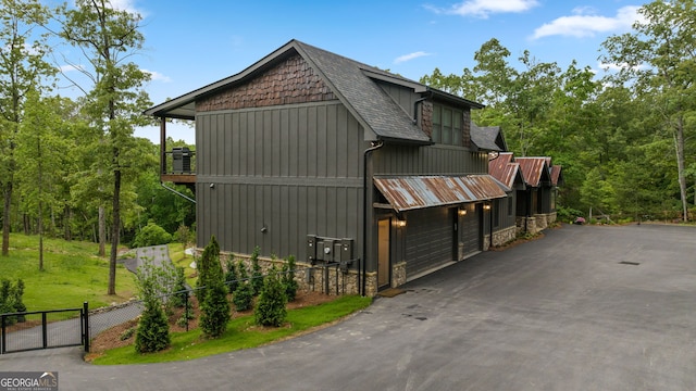 view of property exterior with a garage