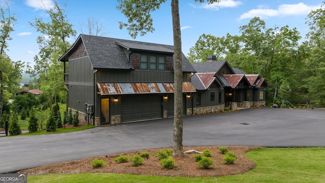 view of front of property featuring a garage