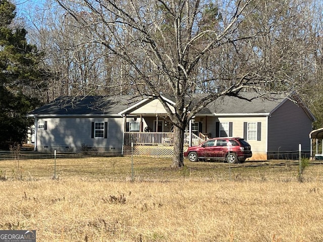 single story home featuring covered porch