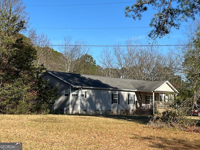 view of front of house with a front lawn and a porch