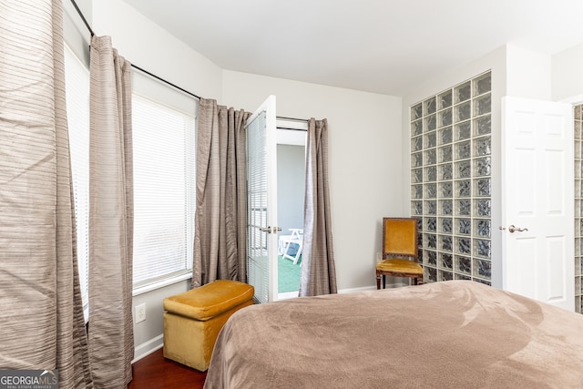 bedroom featuring dark wood-type flooring