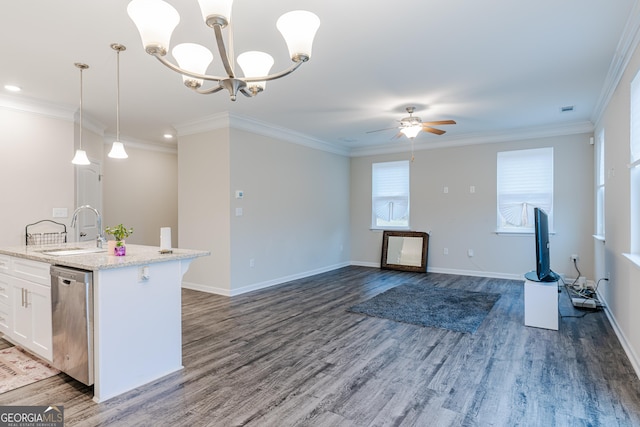 kitchen featuring sink, hanging light fixtures, stainless steel dishwasher, white cabinets, and ceiling fan with notable chandelier