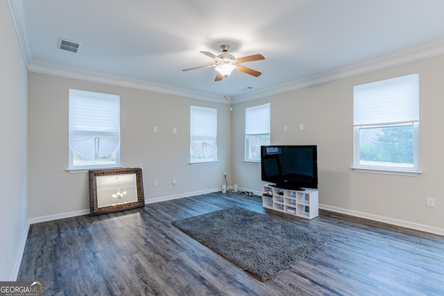 living room with crown molding, dark hardwood / wood-style flooring, and ceiling fan