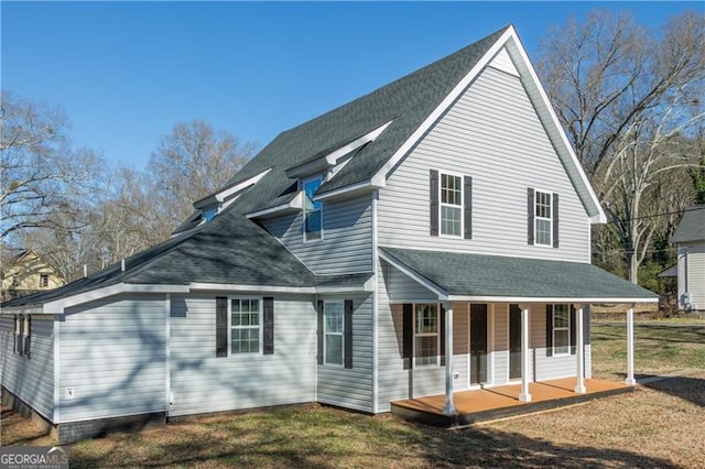 exterior space with a lawn and a porch