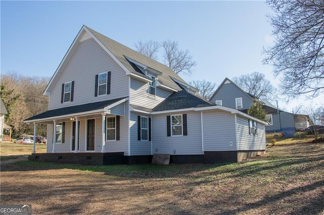 view of home's exterior with a porch