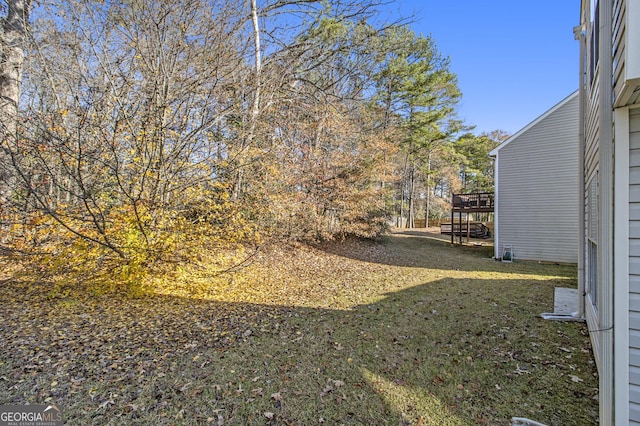 view of yard featuring a deck