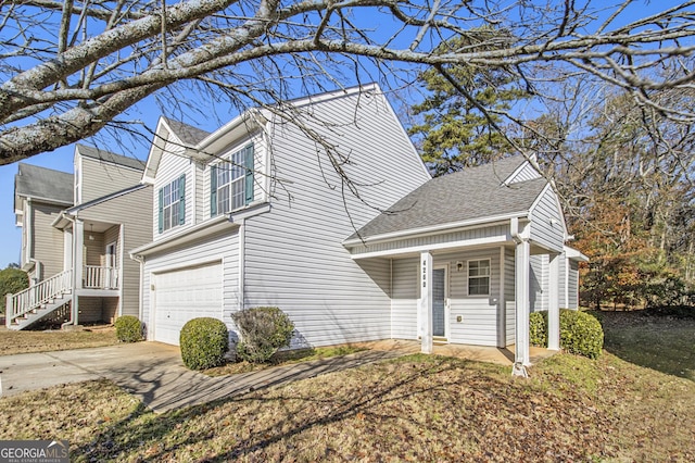 view of front of property with a garage