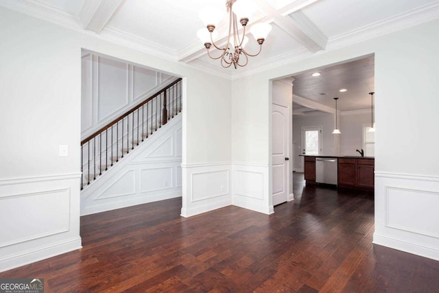 unfurnished dining area featuring beamed ceiling, dark hardwood / wood-style floors, crown molding, and a chandelier