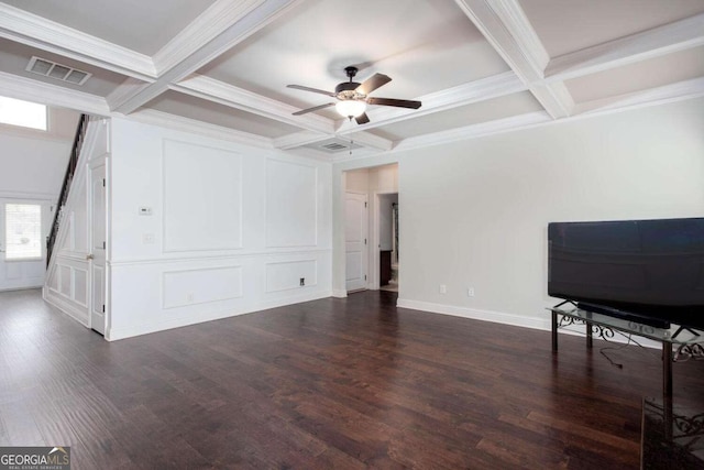 living room with crown molding, beamed ceiling, and coffered ceiling