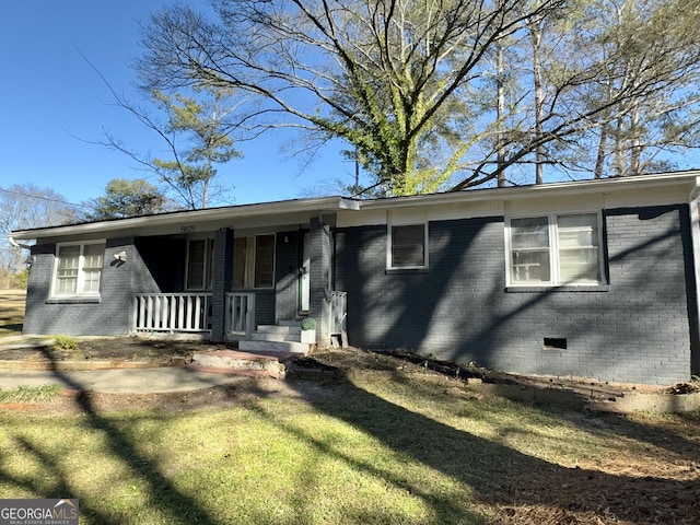 view of front of home with a front lawn and a porch