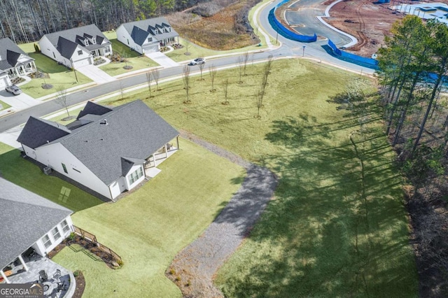 rear view of property with a lawn and a patio area