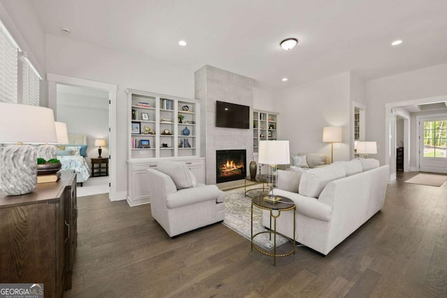 kitchen with sink, hanging light fixtures, tasteful backsplash, light stone counters, and appliances with stainless steel finishes