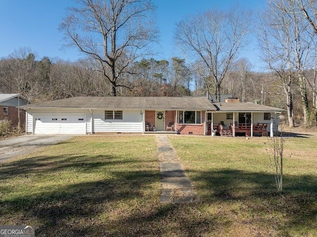 ranch-style house with a porch, a garage, and a front yard